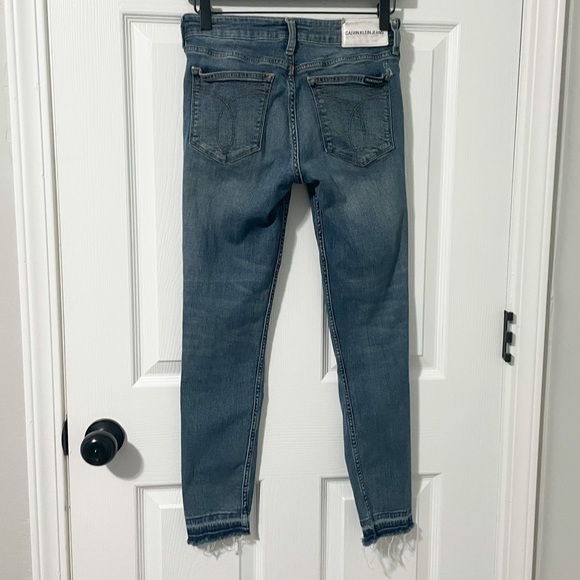 Calvin Klein Distressed Jeans with Raw Hem - size 26x28 - Picture 4 of 6